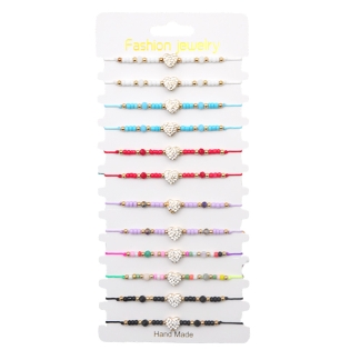 Sutraukiama apyrankė su...